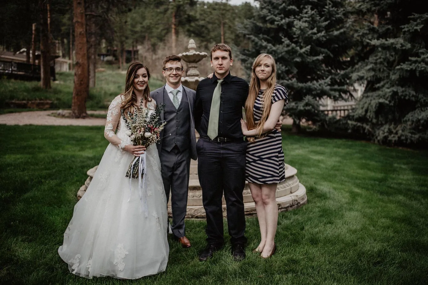 Standing with the couple after officiating their wedding